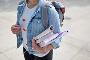 Student carrying books