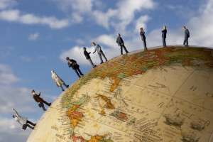 People walking on a globe