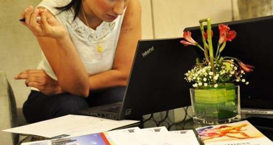 Woman Writing a CIPD Assignment