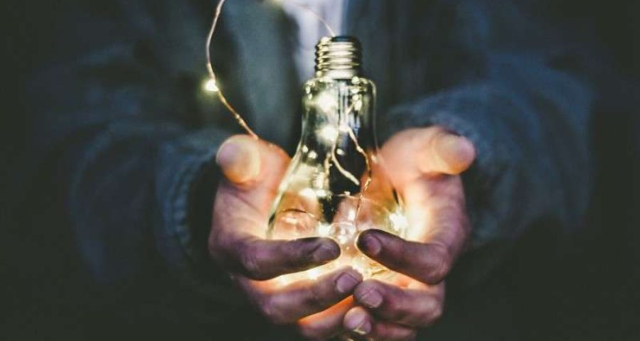 Man holding lightbulb