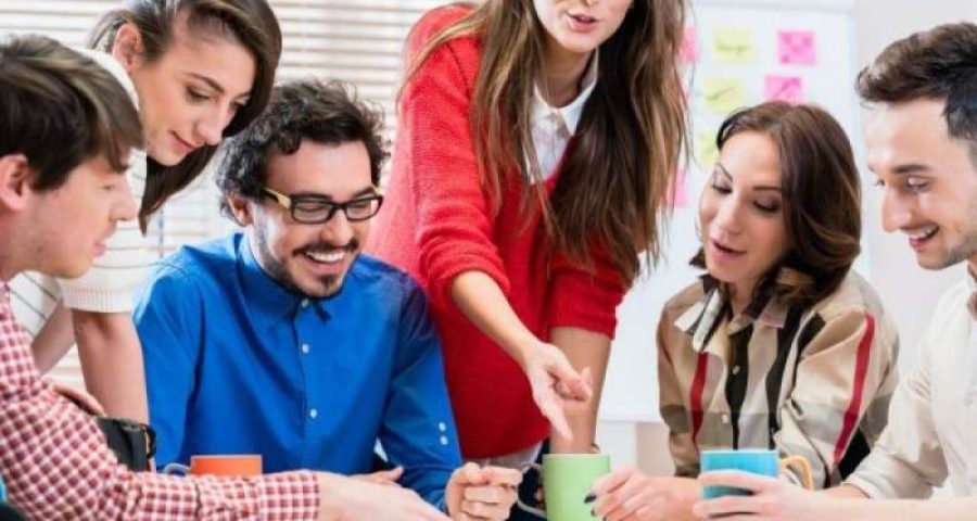 Happy team working together in UAE