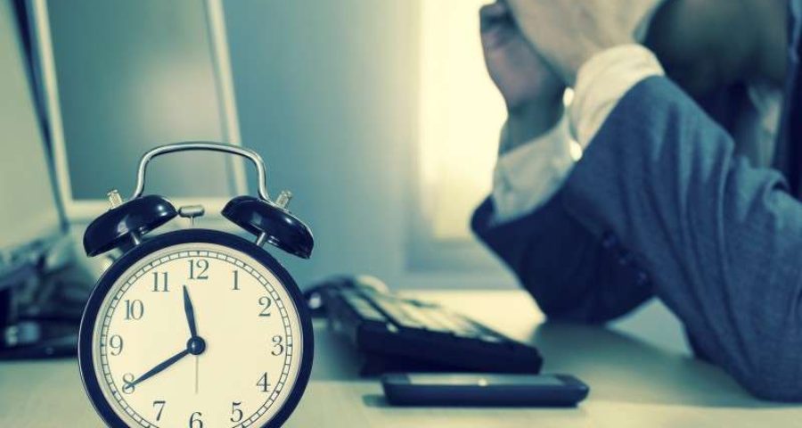 Stressed man in front of computer